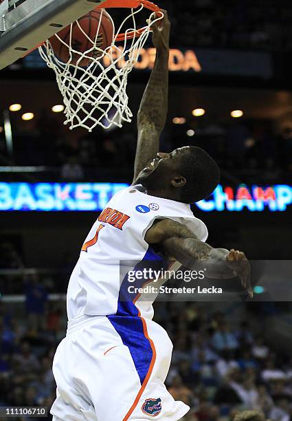 Kenny Boynton of the Florida Gators dunks against the Butler Bulldogs during the Southeast regional final of the 2011 NCAA men's basketball...