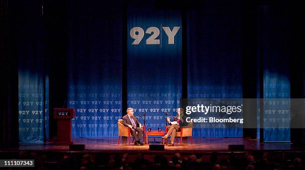 Paul Krugman, professor of international trade and economics at Princeton University and Nobel Prize-winning economist, left, listens to Jeff...