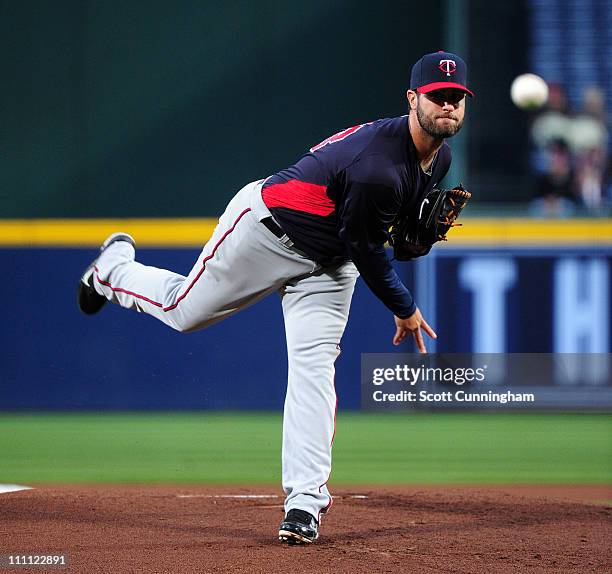 Nick Blackburn of the Minnesota Twins pitches against the Atlanta Braves at Turner Field on March 29, 2011 in Atlanta, Georgia.