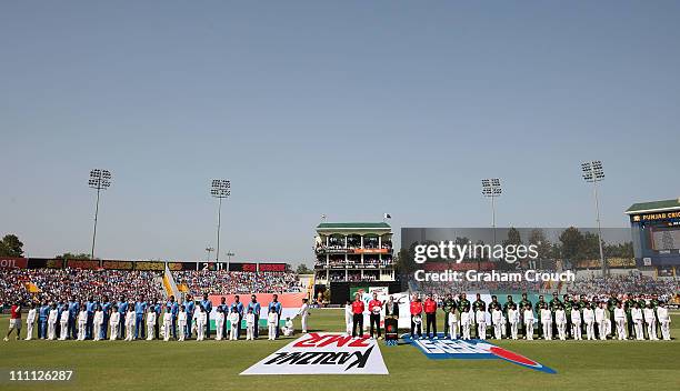 India and Pakistan line up for the national anthems before the 2011 ICC World Cup second Semi-Final between Pakistan and India at Punjab Cricket...