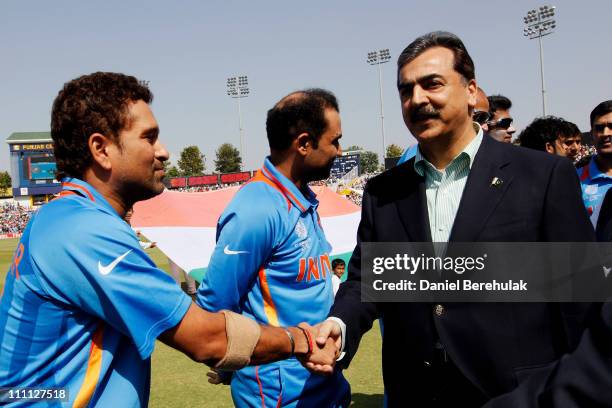 Prime Minister Syed Yusuf Raza Gilani of Pakistan shakes hands with Sachin Tendulkar of India prior to the start of the 2011 ICC World Cup second...