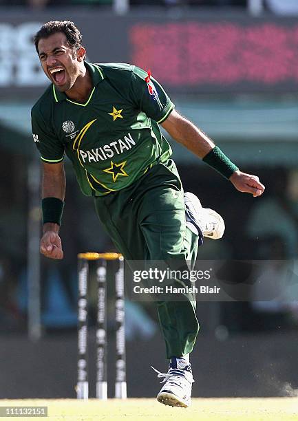 Wahab Riaz of Pakistan celebrates after taking the wicket of Yuvraj Singh of India during the 2011 ICC World Cup second Semi-Final between Pakistan...