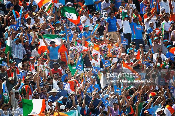 Spectators enjoy the atmosphere during the 2011 ICC World Cup second Semi-Final between India and Pakistan at Punjab Cricket Association Stadium on...