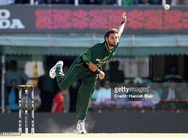 Shahid Afridi of Pakistan in action during the 2011 ICC World Cup second Semi-Final between Pakistan and India at Punjab Cricket Association Stadium...