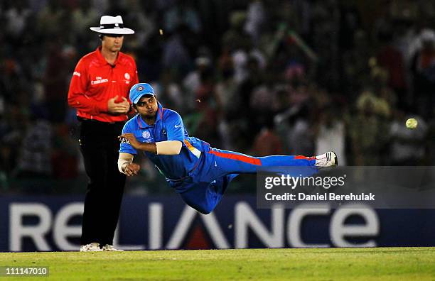 Suresh Raina of India fields during the 2011 ICC World Cup second Semi-Final between India and Pakistan at Punjab Cricket Association Stadium on...