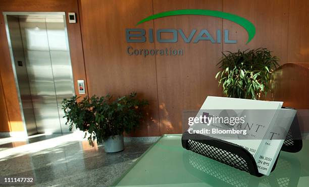 Valeant Pharmaceuticals International Inc. Business cards are displayed in the lobby of company's headquarters in Mississauga, Ontario, Canada, on...