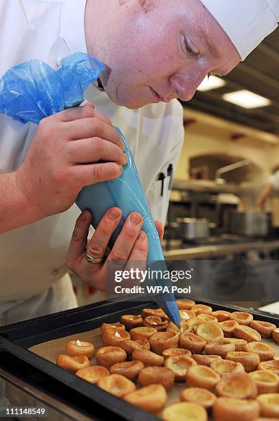 Sous chef Mark Stewart prepares a tray of Mini Yorkshire Puddings with Roast Beef and Horse Radish Cream canapes, food akin to that which is usually...