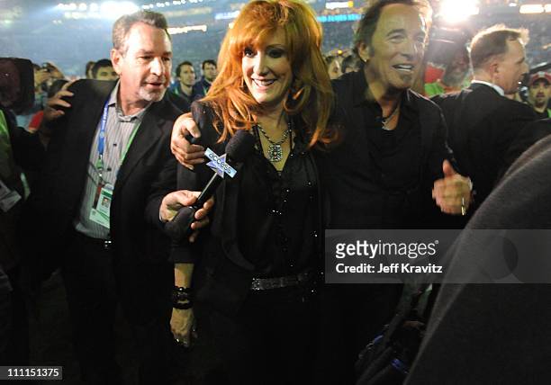 Musician Bruce Springsteen and vocalist Patti Scialfa at the Bridgestone halftime show during Super Bowl XLIII between the Arizona Cardinals and the...