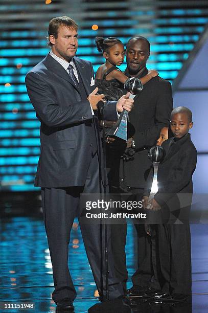 Football players Ben Rothlisberger, Santonio Holmes and children onstage during the 17th annual ESPY Awards held at Nokia Theatre LA Live on July 15,...