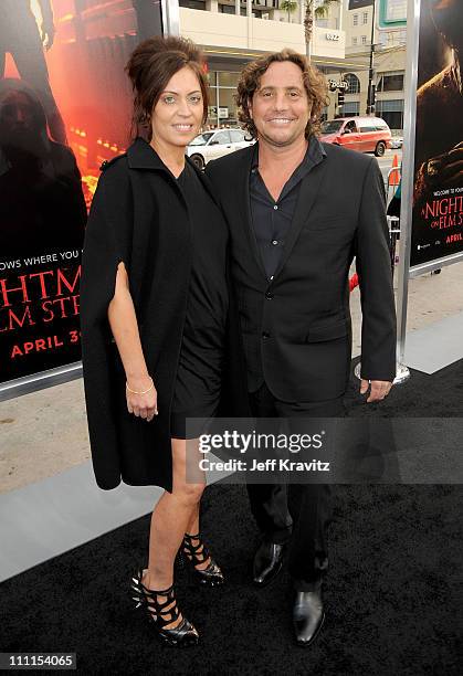 Director Samuel Bayer and guest arrive at the Los Angeles premiere of "A Nightmare On Elm Street" held at Grauman's Chinese Theatre on April 27, 2010...