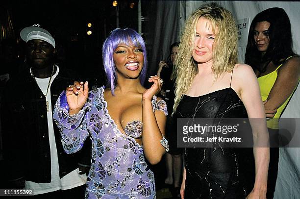 Lil' Kim and Renee Zellweger during 1999 MTV Music Awards Arrivals at Lincoln Center in New York City, New York, United States.
