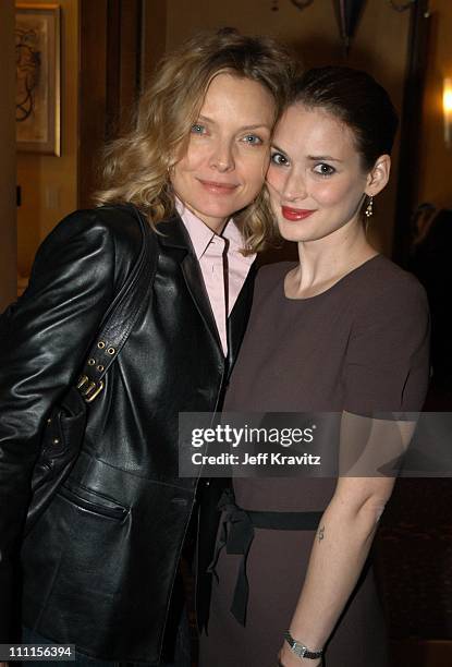 Michelle Pfeiffer and Winona Ryder during Women in Film Luncheon Honoring Martin Scorsese at Spago in Beverly Hills, CA, United States.