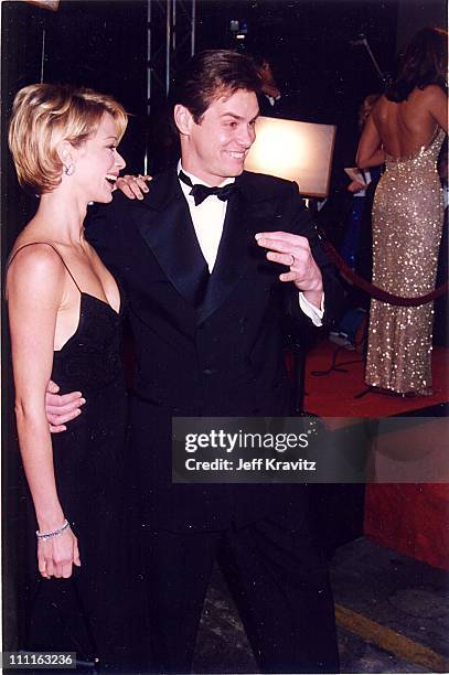 Jim Carrey & Lauren Holly during 1996 Fire & Ice Ball at Warner Bros. Studios in Burbank, California, United States.