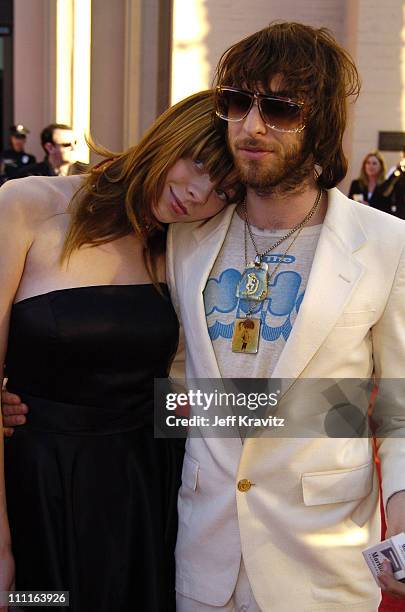 Chris Cester of Jet and guest during 32nd Annual American Music Awards - Red Carpet at Shrine Auditorium in Los Angeles, California.