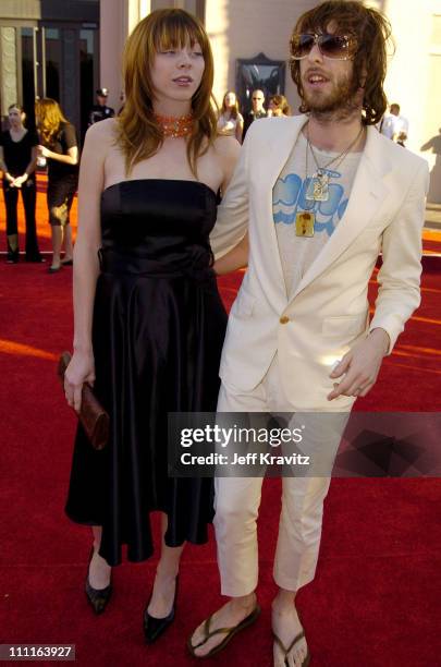 Chris Cester of Jet and guest during 32nd Annual American Music Awards - Red Carpet at Shrine Auditorium in Los Angeles, California.