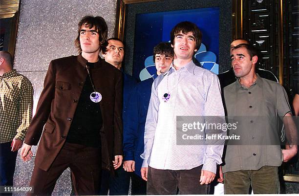 Liam Gallagher, Noel Gallagher and Paul "Bonehead" Arthurs of Oasis