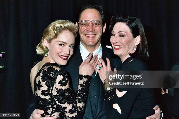 Sharon Stone, Raul Julia and Anjelica Huston during 1993 ShoWest in Las Vegas, Nevada, United States.