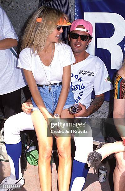 Heather Locklear with Tommy Lee of Motley Crue during TJ Martell Music and Sports Event, 1989 in Los Angeles, California, United States.