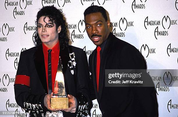 Michael Jackson & Eddie Murphy during 16th Annual American Music Awards in Los Angeles, California, United States.