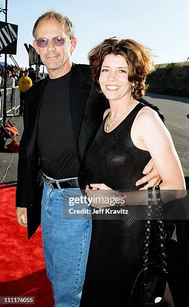 Christopher Lloyd and wife Jane Walker Wood during 1998 MTV Movie Awards in Los Angeles, California, United States.