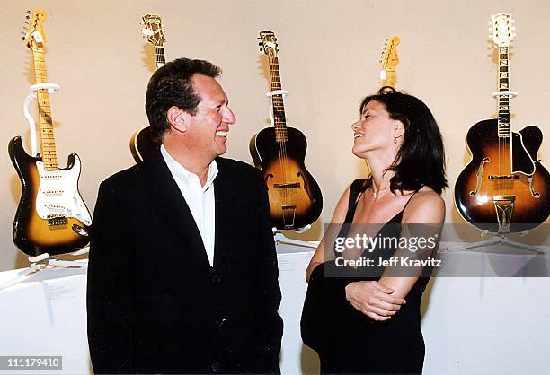 Garry Shandling & Linda Fiorentino during 1999 Eric Clapton concert & Giorgio Armani fashion show in Los Angeles, California, United States.