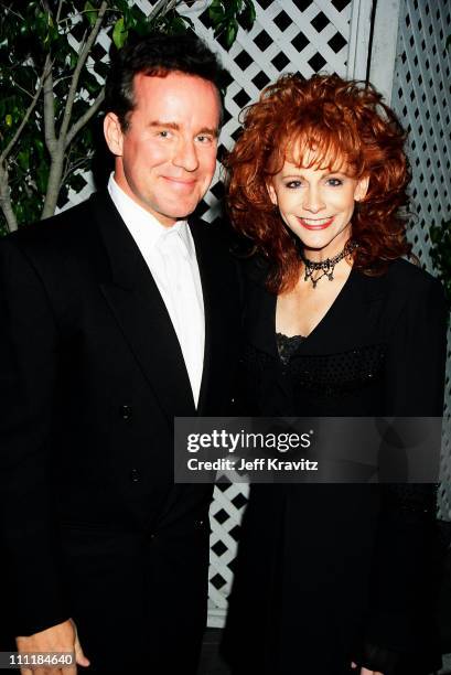 Phil Hartman and Reba McEntire during Fox Billboard Awards 1994-Backstage at Universal Amphitheater in Universal City, California, United States.