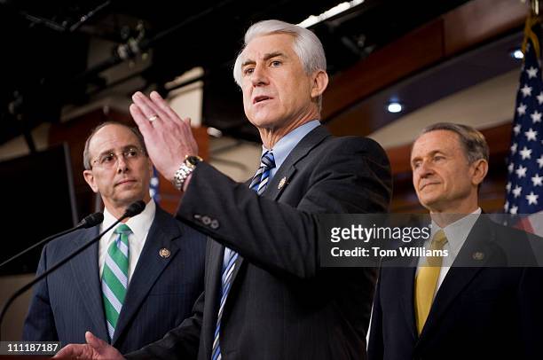 From left, Reps. Charles Boustany, R-La., Dave Reichert, R-Wash., and Wally Herger, R-Calif., conduct a news conference in the Capitol Visitor Center...