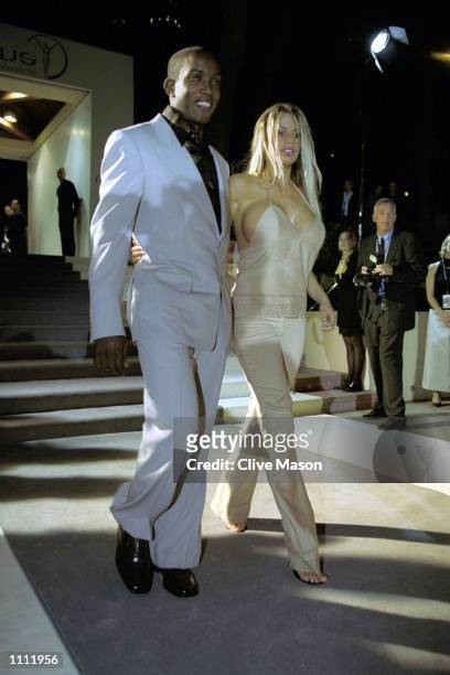 Footballer Dwight Yorke with model Jordan at the Laureus Night of Sport and Film at the Monte Carlo Beach Club Hotel prior to the Laureus World...