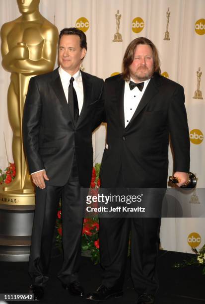 Tom Hanks, presenter, and William Monahan, winner Best Adapted Screenplay for "The Departed"