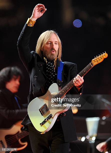 Musicians Tom Petty & The Heartbreakers perform during the 'Bridgestone Halftime Show' at Super Bowl XLII between the New York Giants and the New...