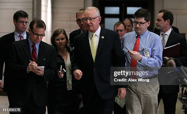 Rep. Howard "Buck" McKeon talks to members of the media as he arrives at a closed briefing on U.S. Military action in Libya March 30, 2011 on Capitol...