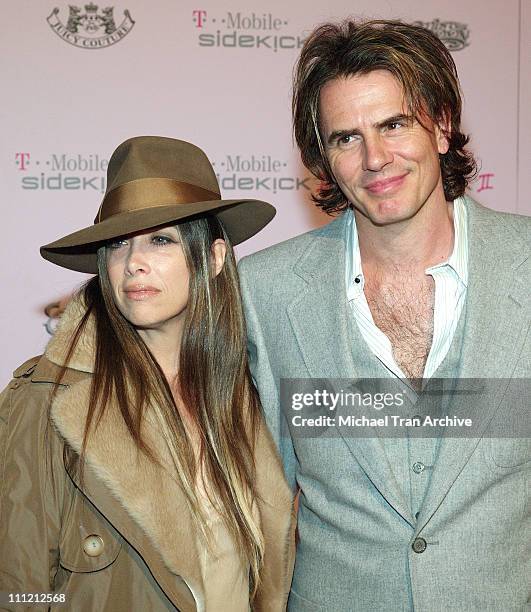 Gela Nash of Juicy Couture and John Taylor during T-Mobile Limited Edition Sidekick II Launch - Arrivals at T-Mobile Sidekick II City in Los Angeles,...