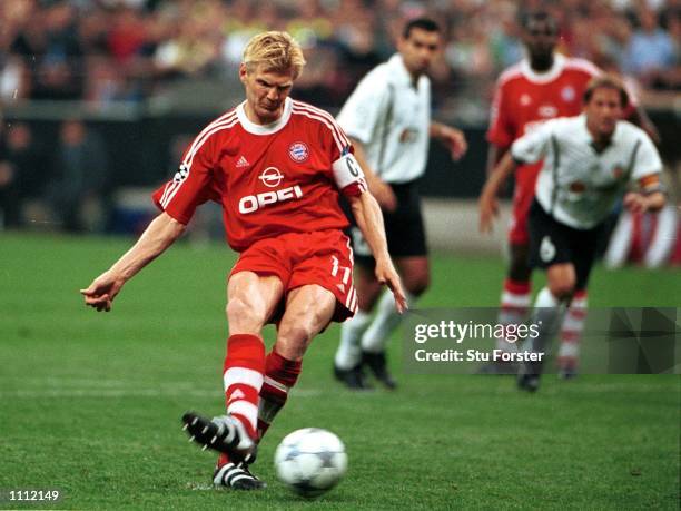 Stefan Effenberg of Bayer Munich scores from the penalty spot during the match between Valencia and Bayern Munich in the UEFA Champions League Final...