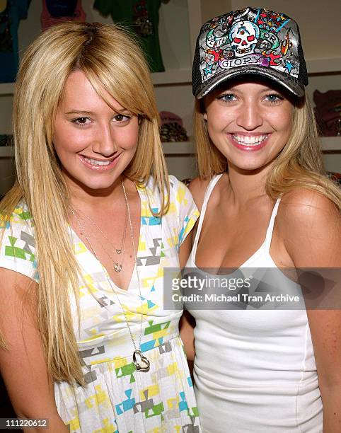 Ashley Tisdale and Lauren Storm during Young Hollywood Rocks Ed Hardy Store - May 2, 2006 at Ed Hardy Store in Los Angeles, California, United States.