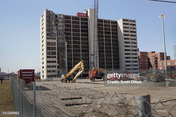 Wrecking crew begins the demolition of the last remaining high-rise building from the infamous Cabrini-Green housing project March 30, 2011 in...