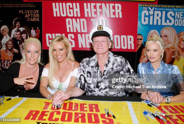 Hugh Hefner with Playmates Kendra Wilkinson, Bridget Marquardt and Holly Madison