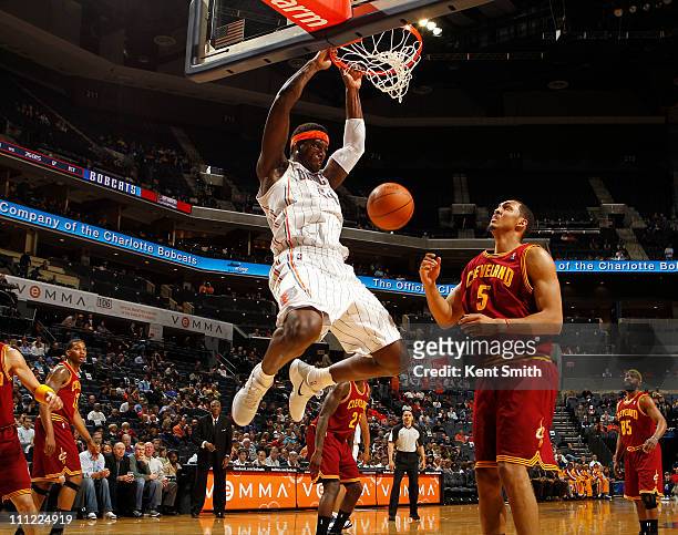 Kwame Brown of the Charlotte Bobcats puts down a dunk against the Cleveland Cavaliers on March 30, 2011 at Time Warner Cable Arena in Charlotte,...