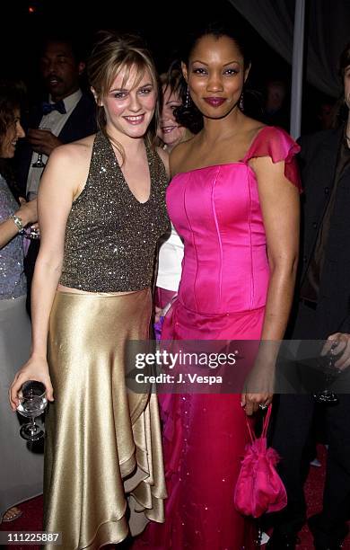 Alicia Silverstone & Garcelle Beauvais during Marc Anthony Pilots Jaguar's Tribute To Style - March 18, 2001 at Barker Hangar in Santa Monica,...