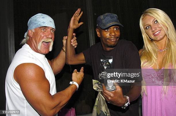 Hulk Hogan, Dave Chappelle and Brooke Hogan during Boost Mobile Party at Crobar in Miami Beach, Florida.