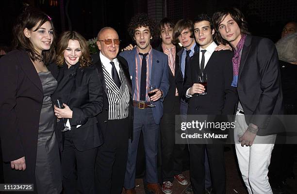 Drew Barrymore, Clive Davis and The Strokes during 2003 Clive Davis Pre-GRAMMY Party - Inside at The Regent Wall Street in New York City, New York,...