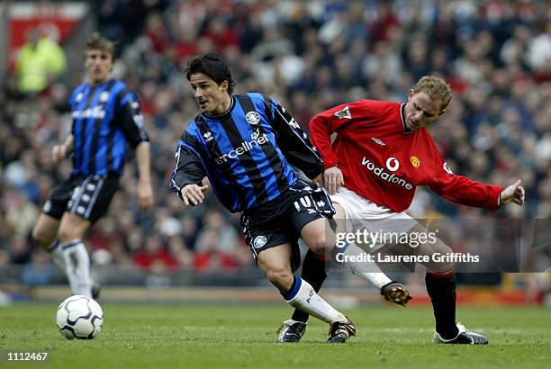 Nicky Butt of Man Utd battles with Benito Carbone of Middlesbrough during the Manchester United v Middlesbrough FA Barclaycard Premiership match at...