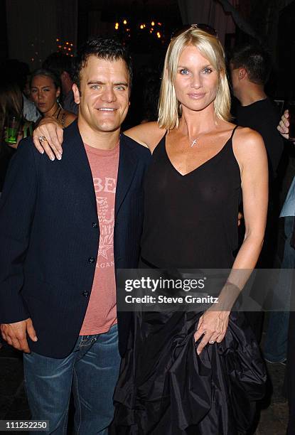 Kevin Weisman and Nicollette Sheridan during ABC 2005 Summer Press Tour All-Star Party - Inside Party at The Abby in West Hollywood, California,...