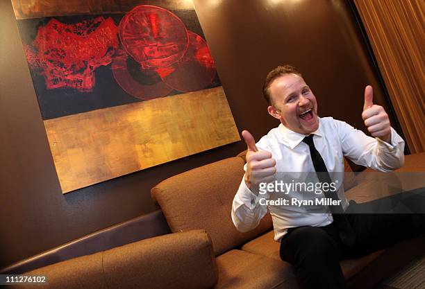 Director Morgan Spurlock poses during CinemaCon, the official convention of the National Association of Theatre Owners, at The Colosseum of Caesars...