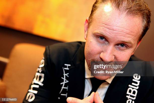 Director Morgan Spurlock poses during CinemaCon, the official convention of the National Association of Theatre Owners, at The Colosseum of Caesars...