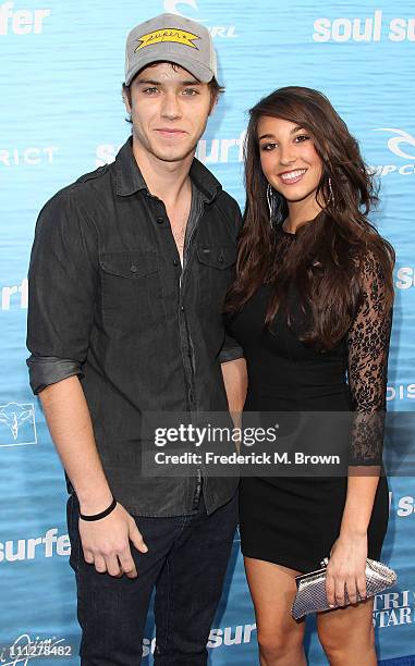 Actor Jeremy Sumpter and his guest attend the premiere of TriStar Pictures' "Soul Surfer" at the ArcLight Cinerama Dome on March 30, 2011 in...