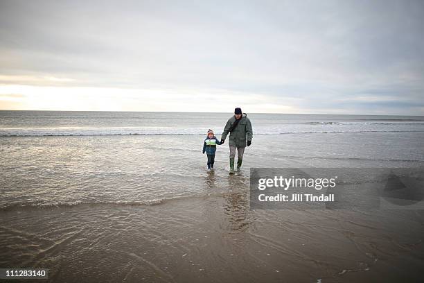 walking back to the beach - st bees stock pictures, royalty-free photos & images