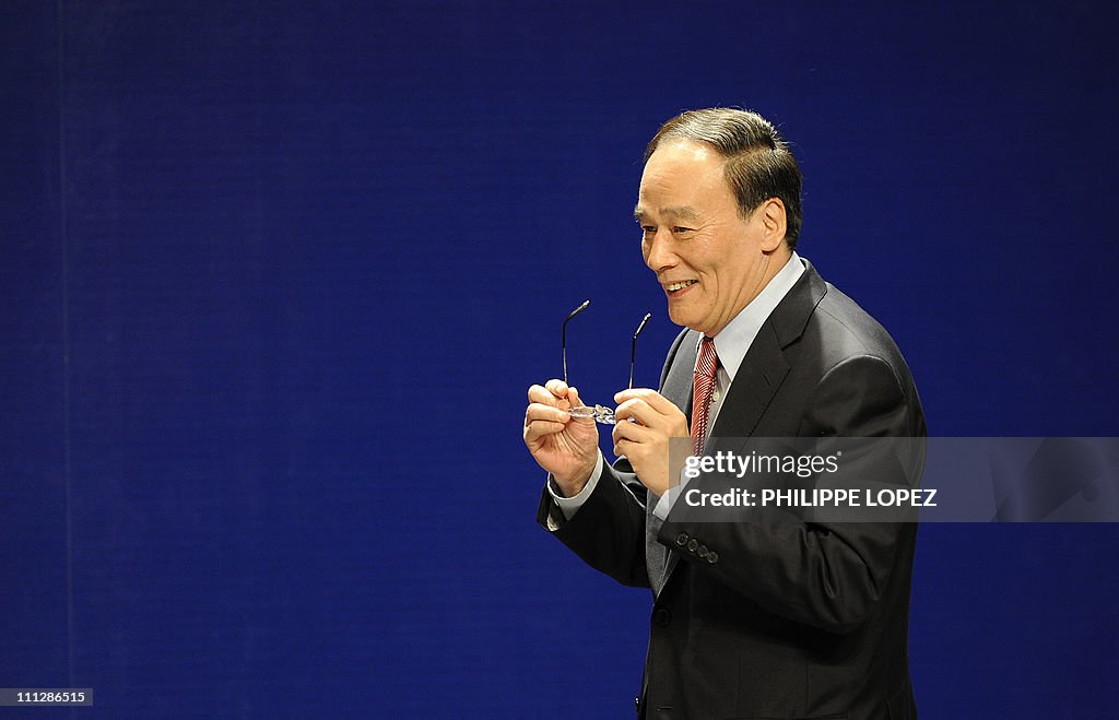 China's Vice Premier Wang Qishan prepare