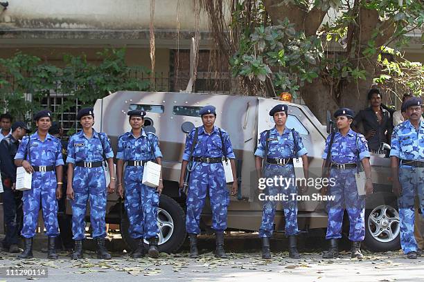 Polica and army personnel crowd the streets outside the ground during the Sri Lanka nets session at the Wankhede Stadium on March 31, 2011 in Mumbai,...