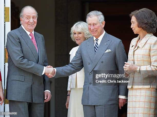 King Juan Carlos of Spain, Camilla, Duchess of Cornwall, Prince Charles, Prince of Wales and Queen Sofia of Spain are received at Zarzuela Palace on...