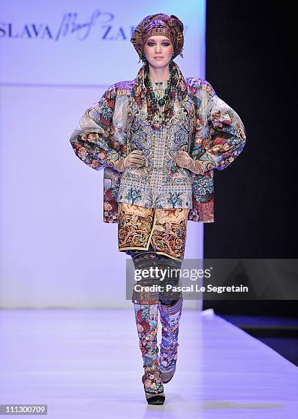 Models wears a creation by designer Slava Zaitsev during his fashion show on Day 1 of the Mercedes-Benz Fashion Week Russia Fall/Winter 2011/2012 at...